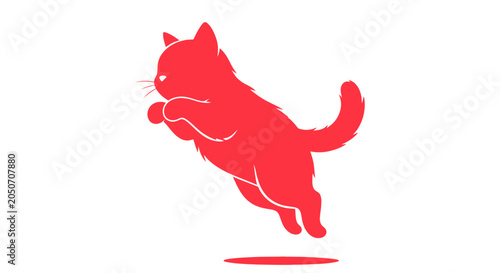 Red cat jumping in mid air.