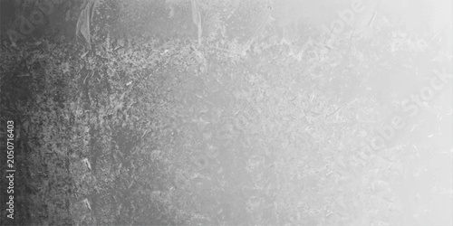 Photos Textured metallic surface in grayscale, abstractly depicting flowing patterns and light reflections, suggestive of polished metal or stone