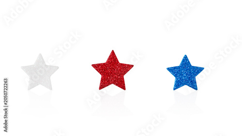 A row of three sparkling glittery stars in white, red, and blue colors isolated on a white background. Perfect design element for USA Independence Day 4th of July sales, political election campaigns