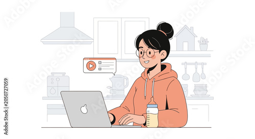 Young woman working on laptop in kitchen with baby bottle nearby, online learning concept