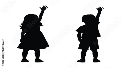 Obraz na płótnie Children silhouettes stand side by side while reaching their hands toward the upper corner