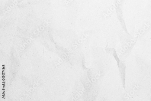 White recycled craft paper texture as background. Grey paper texture, Old vintage page or grunge vignette of old newspaper. Pattern rough art creased grunge letter. Hardboard with copy space for text.