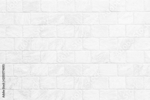 Kitchen wallpaper concept: Close up modern white brick tiles wall texture background, White brick wall texture background for stone tile block in grey light color wallpaper modern interior.