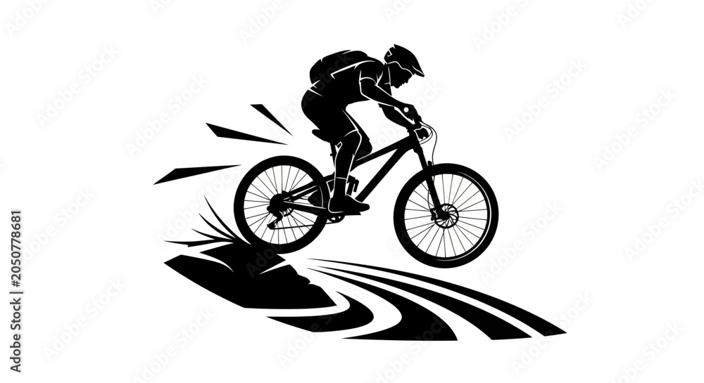 Fototapeta premium Silhouette of a Mountain Biker Riding Downhill.