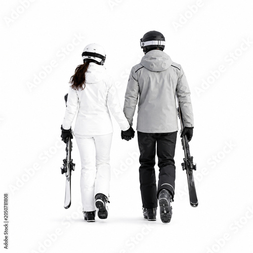 Rear view of a young couple dressed in modern ski clothing walking side by side while carrying skis. Isolated on a clean white background, the image represents winter sports, outdoor recreation.