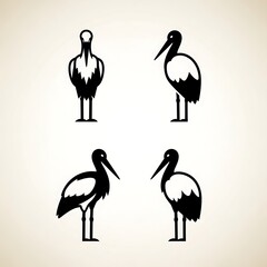 Four black silhouettes of ballet dancers in various poses.