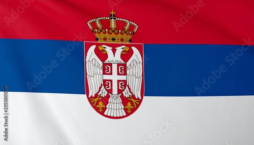 Flag of Serbia with tricolor stripes and crowned eagle emblem.