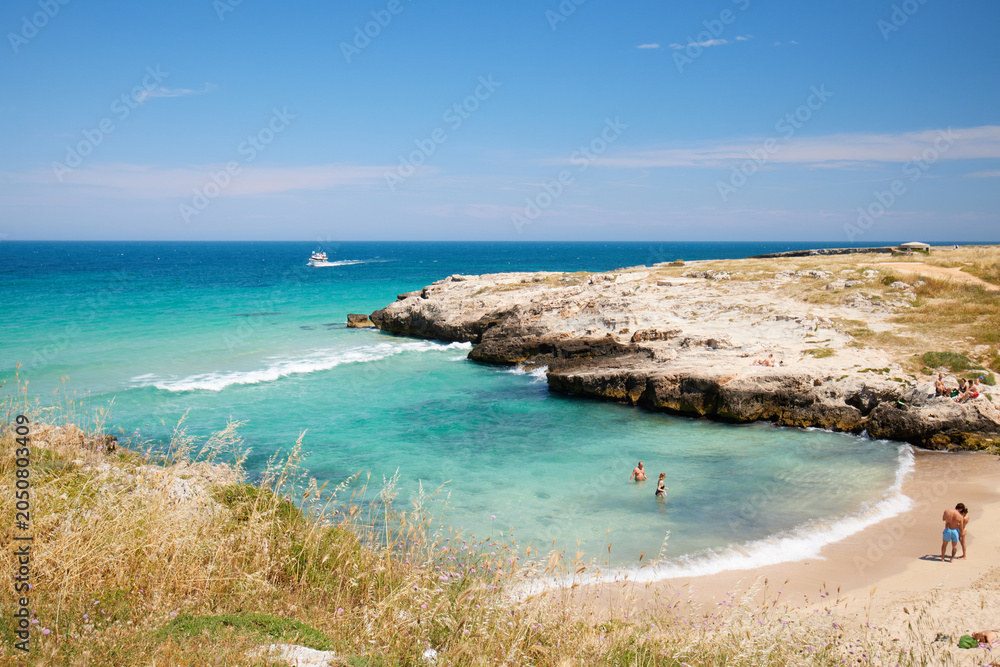 Fototapeta premium People at a beach in Monpoli, Puglia, Italy