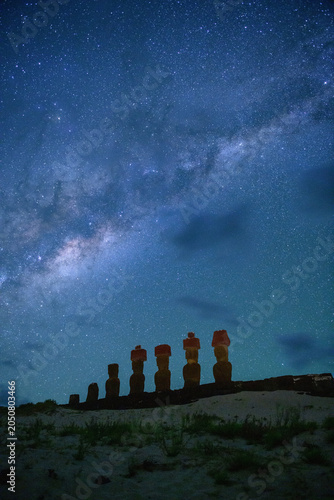 Fotografija Peaceful moai statue on easter island chile beneath mysterious starry night sky