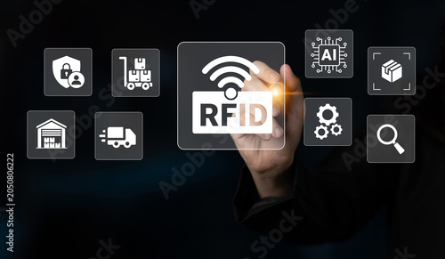 Tableau sur toile A close-up view of a hand interacting with a digital interface showcasing RFID technology, emphasizing its role in improving supply chain management and logistics systems