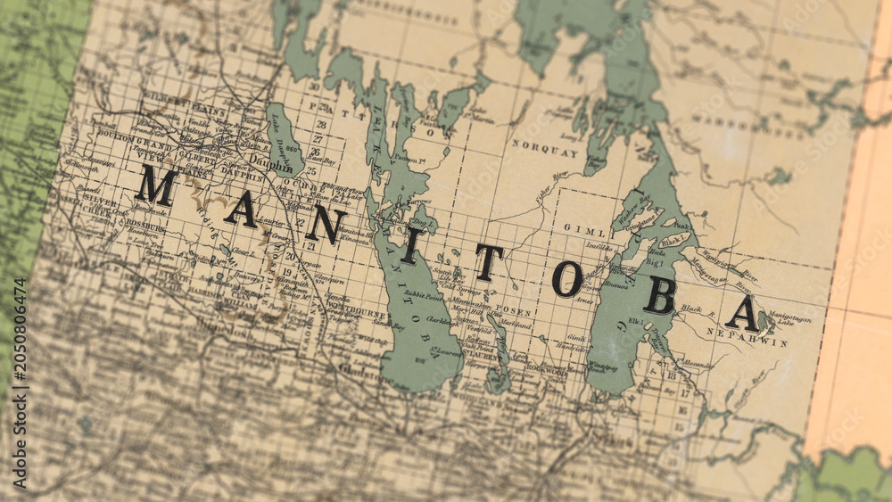 Fototapeta premium Macro View of Vintage Map Highlighting Manitoba Canada with Detailed Geographic Cartography.
