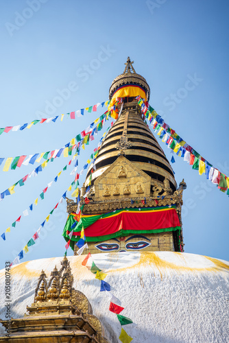 Fotografie A stunning low-angle photograph of the sacred Boudhanath Stupa in Kathmandu, Nep
