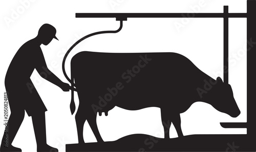 Milking machine attached to cow animal
