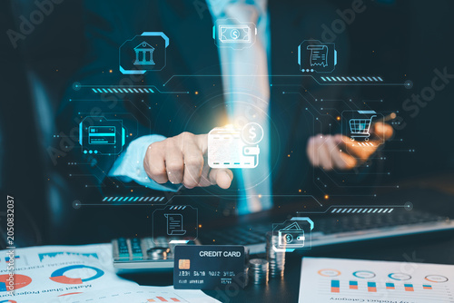 Businessman touching digital wallet icon on virtual screen, fintech innovation, online payment, banking transfer and financial management concept via technology.