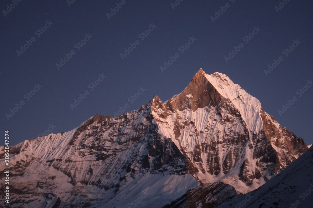 Naklejka premium mountain peak at sunset