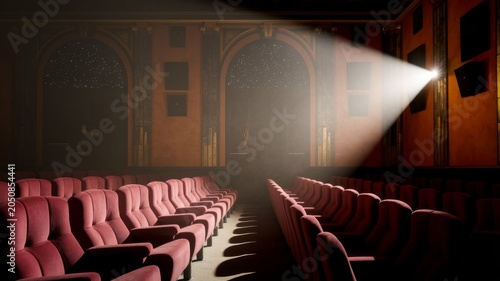 Empty luxury cinema theater with projector light beam and red velvet seats