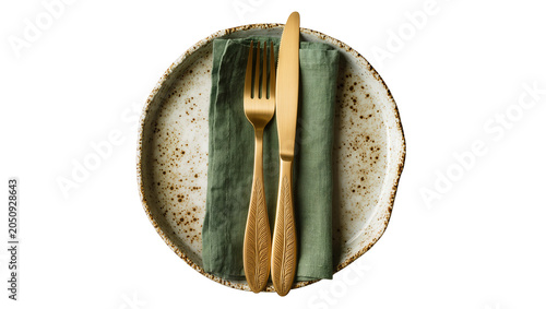 Konstfotografi Gold cutlery set with green napkin on speckled ceramic plate