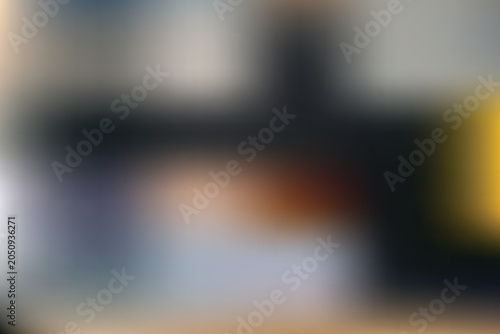 Blurry indoor scene with people sitting on a couch and transparent background elements