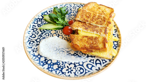 Slices of cheese toast served with sauce on a plate.