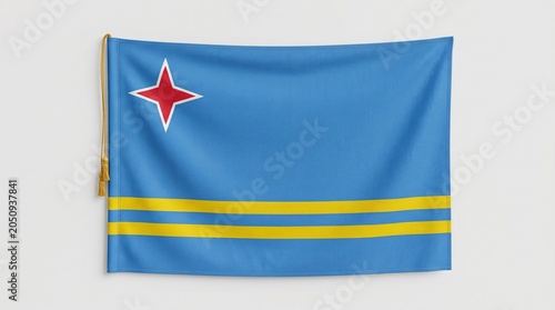 National flag of Aruba with light blue field, yellow stripes, and red star outlined in white, design symbolizes sea, sky, abundance, heritage, and island identity.