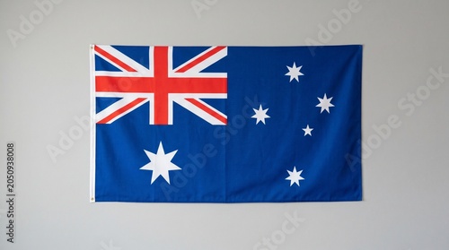 National flag of Australia with blue field, Union Jack, Commonwealth Star, and Southern Cross constellation, design symbolizes heritage, federation, and identity under southern skies.