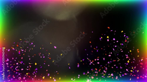 Vibrant confetti particles float in colorful spotlight beams