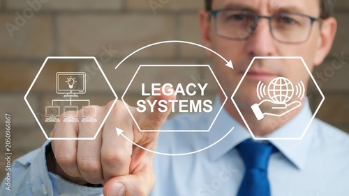 Businessman touching a virtual interface with a legacy systems concept, representing digital transformation