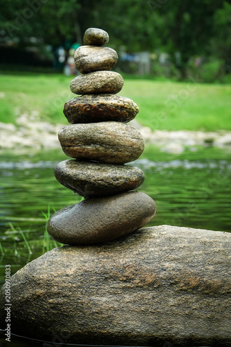 Foto Stack of stones near riverside