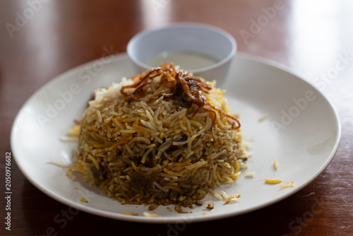 Traditional Biryani with Fried Onions and Raita, Singapore