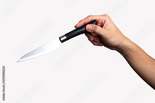 Male hand holding a steel cooking knife isolated on white background.