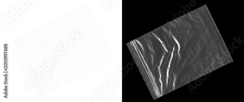 Photos Crumpled plastic texture on black background, wrinkled transparent film overlay,