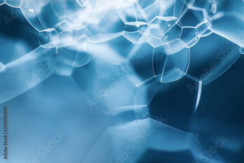 Fotografija Abstract blue water bubbles texture with copy space, macro liquid foam structure for intensive hydration serum, mens grooming or refreshing cosmetic banner