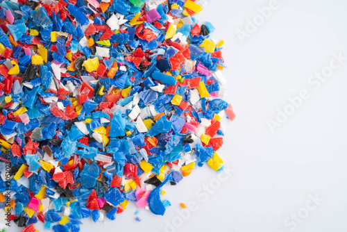 Obraz na plátně Plastic colorful pieces recycling shredded for industrial use.