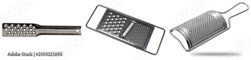 Three different types of metal graters isolated on a white background