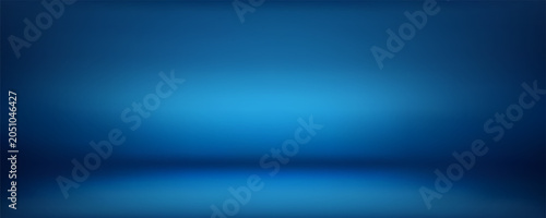 Foto Blue studio room background with spotlight illumination