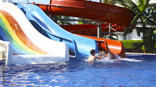 Fotografi Bright Summer Day at the Water Slides Park