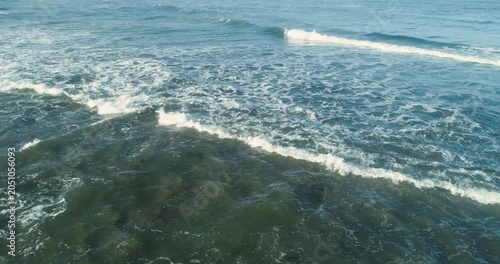 Aerial view of ocean waves rolling The Concept of tranquility