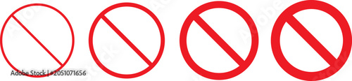 Foto Set of four red prohibition signs with varying line thickness isolated on white