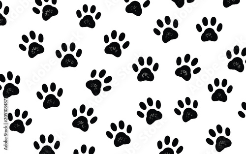 Schilderij op canvas Playful seamless pattern of hand-drawn black dog paw prints with a chalky texture on a clean white background for branding
