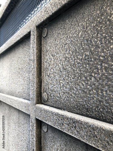Heavy frost and ice texture on industrial metal surface.