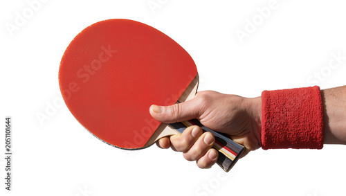 Foto Hand holding red ping pong paddle with wristband
