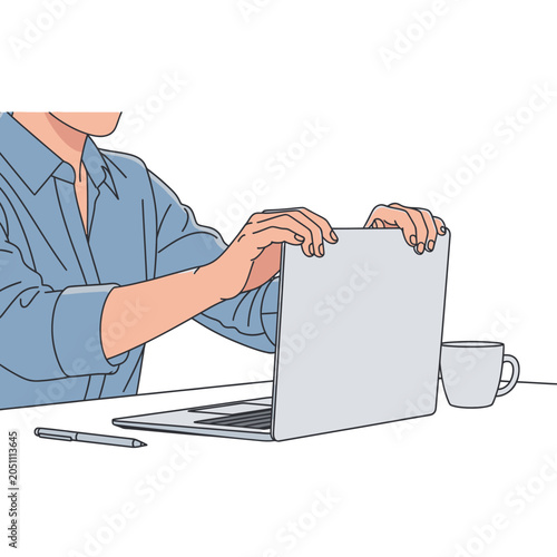 Person working on a laptop computer.