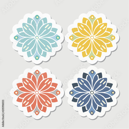 Set of four decorative floral stickers in pastel colors