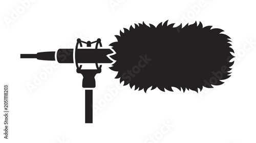 Professional shotgun microphone with windjammer for audio recording.