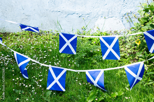 Traditional Scottish flag bunting displayed outdoors 