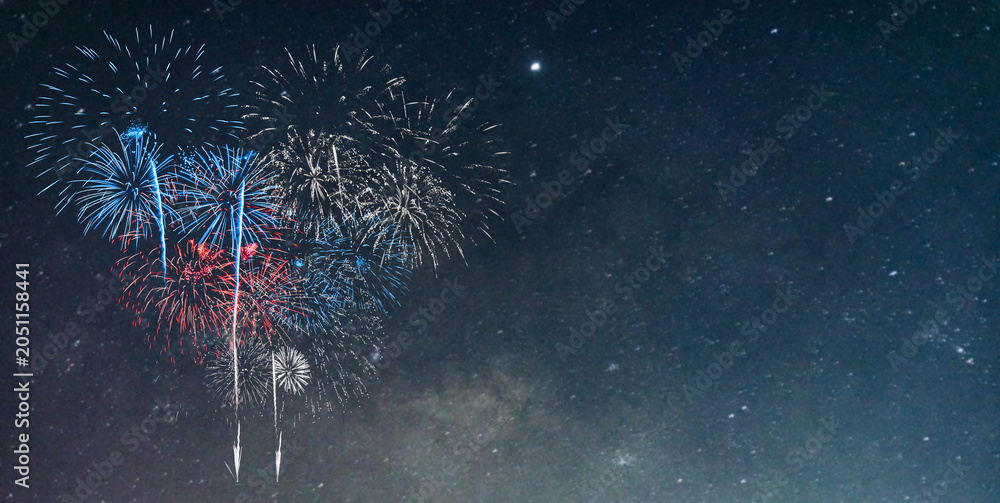 Obraz premium Red and Blue Fireworks on night background