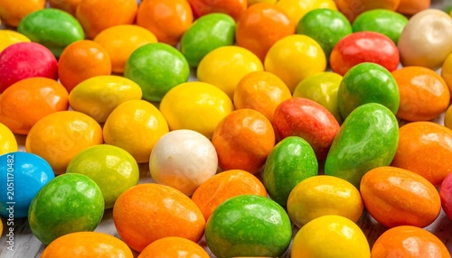 Colorful collection Many small, round candies in assorted vibrant shades, filling the frame in a clustered pattern