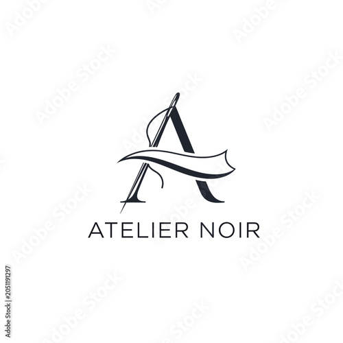 Elegant black and white monogram logo design with calligraphic letter a and text
