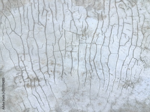 Tableau sur toile Cracked gray concrete wall background with hairline cracks pattern, perfect for modern industrial urban design or architectural material defect report