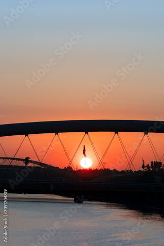 View of a bridge in Krakow at dawn in spring, Poland